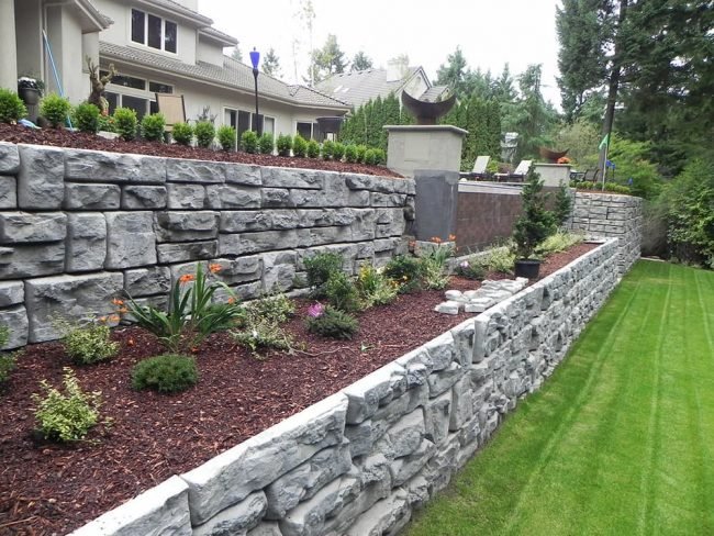 lawn with retaining walls to protect their landscape